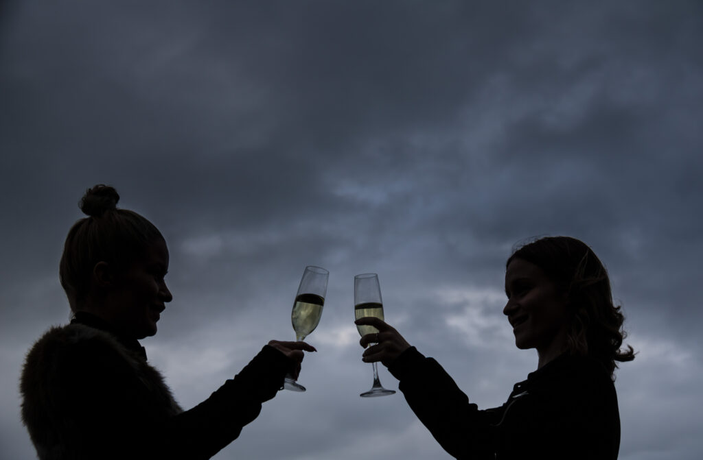 Group raising glasses during a wine tasting